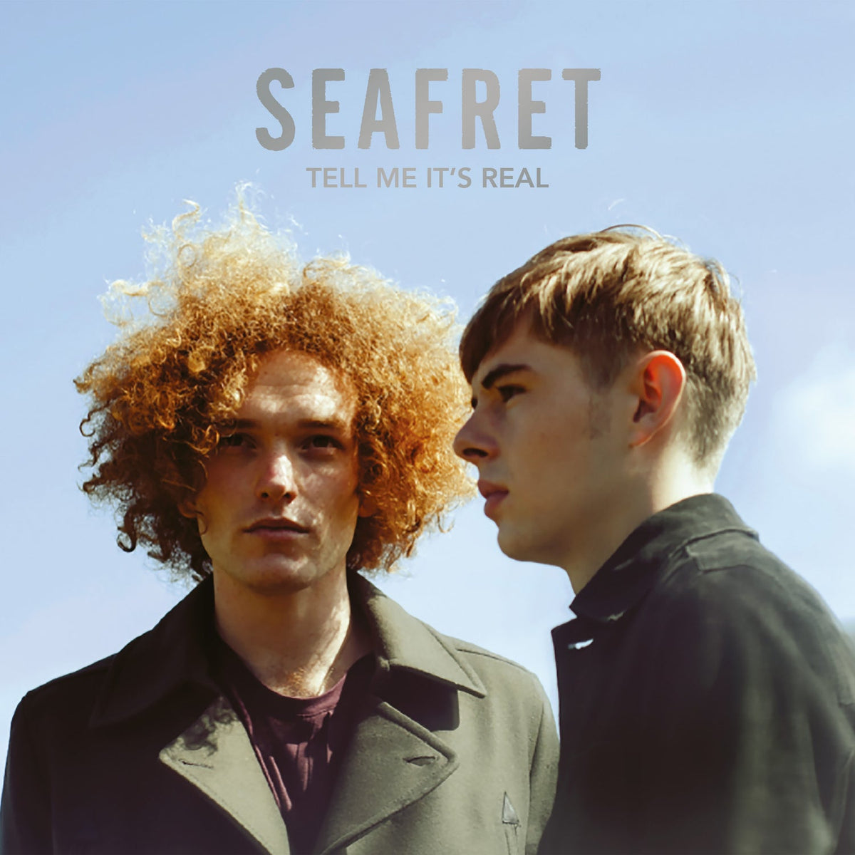 Album cover for Seafret - Tell Me It’s Real on sky blue marbled vinyl foil lettering on front cover lp