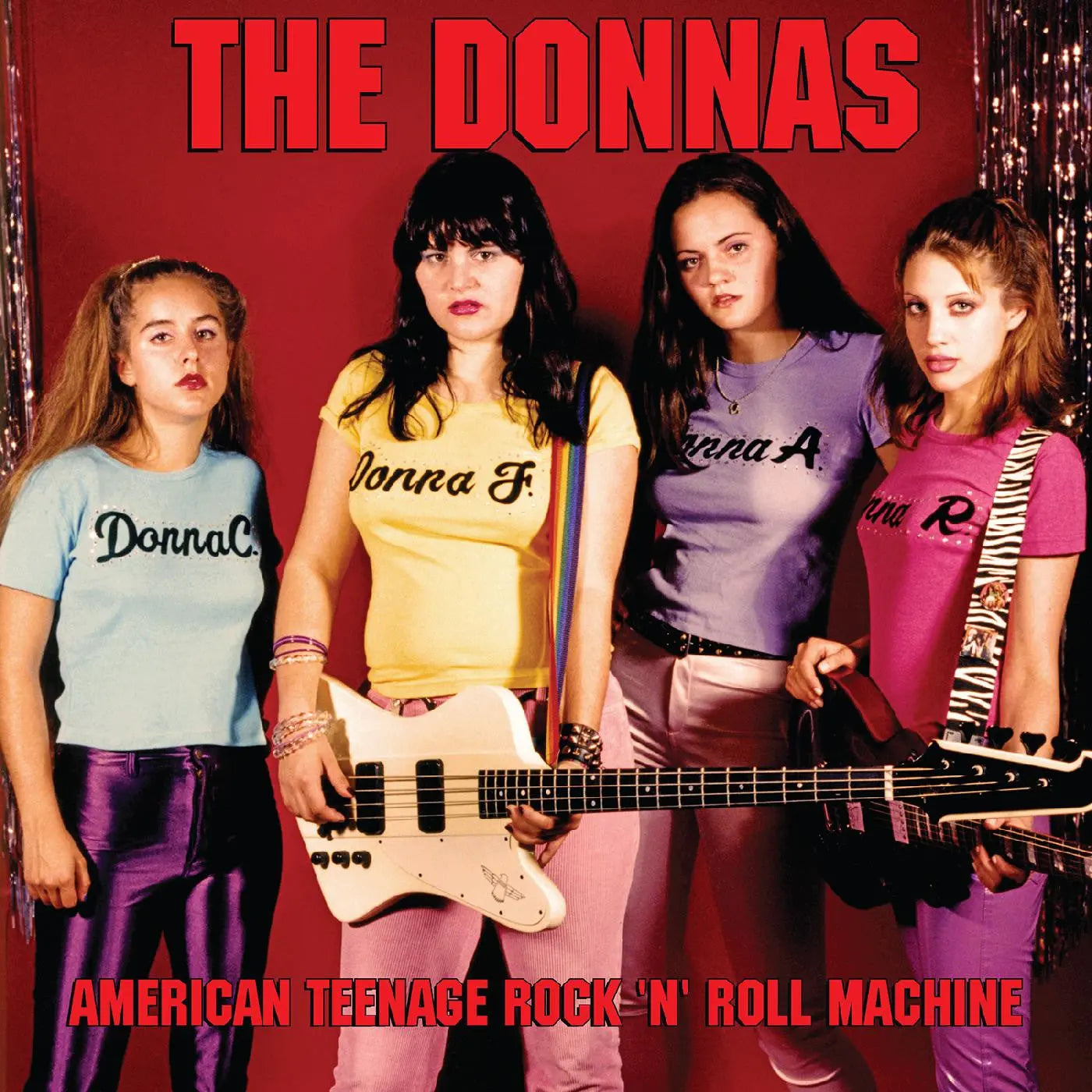 The Donnas - American Teenage Rock 'N' Roll Machine [Fire Orange With Black Swirl Vinyl + Pin-up Calendar]