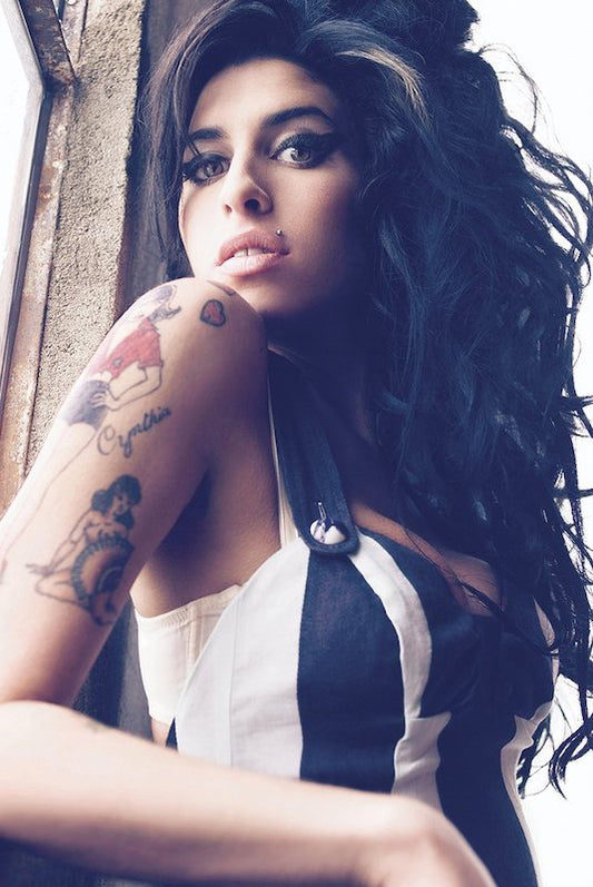 Amy Winehouse Tattoos poster featuring an Amy Winehouse portrait showing her shoulder tattoos