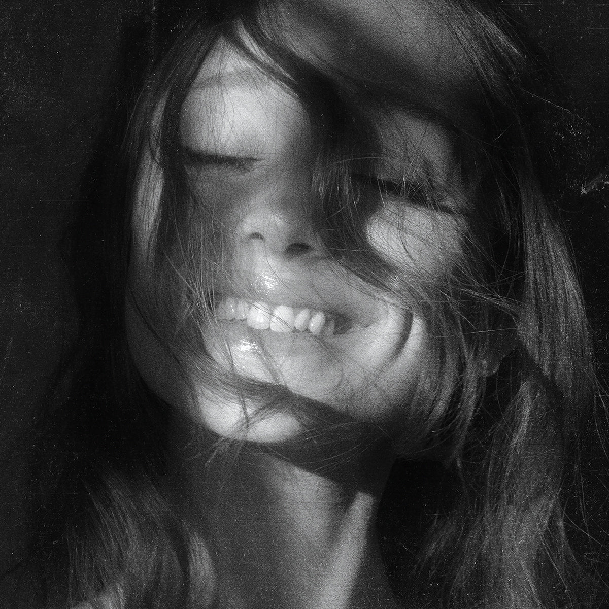 Ariana Grande – Petals poster featuring a black-and-white close-up portrait of Ariana Grande