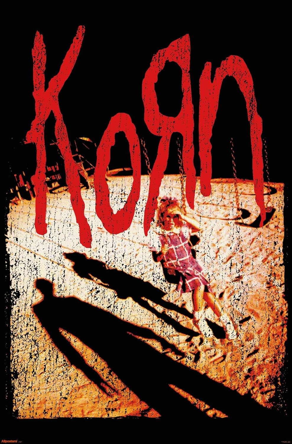 Korn poster featuring the Korn logo over a dark, earth-toned shadow scene